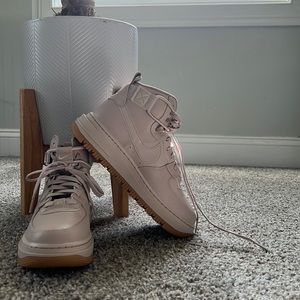 Mauve pink Nike high top 1s